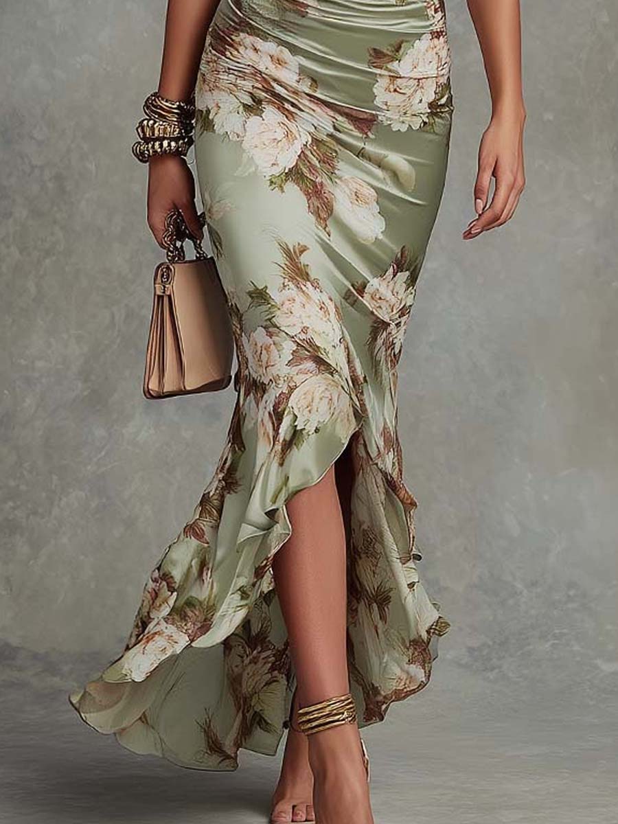 Anna - Asymmetrical long dress in green with V-neck, flared puff sleeves, and floral pattern