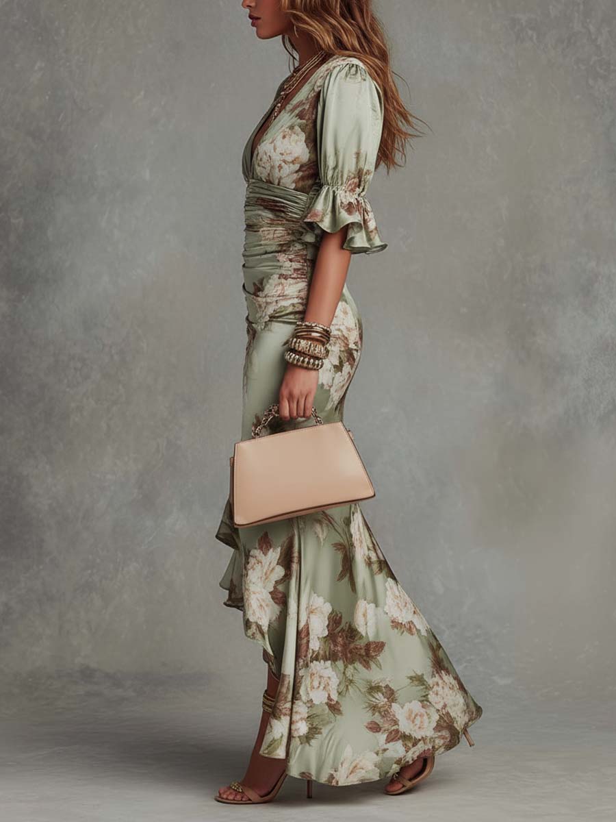 Anna - Asymmetrical long dress in green with V-neck, flared puff sleeves, and floral pattern
